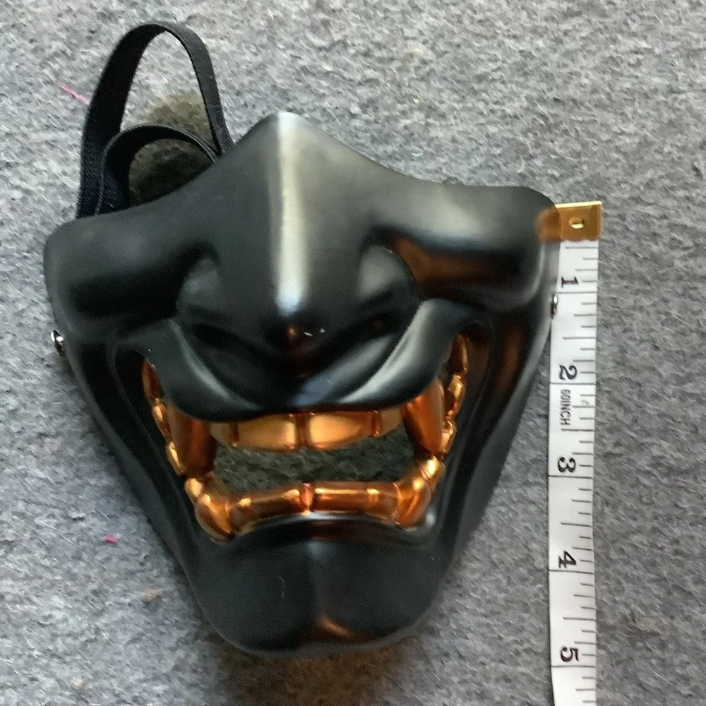 Black and Gold Mask with adjustable strap
